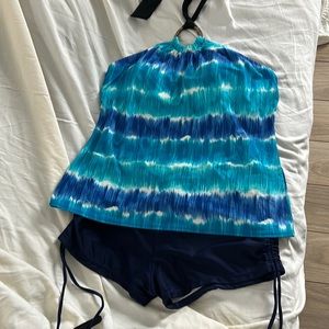Swimsuit tankini with boys short bottoms. Shades of blue size large.